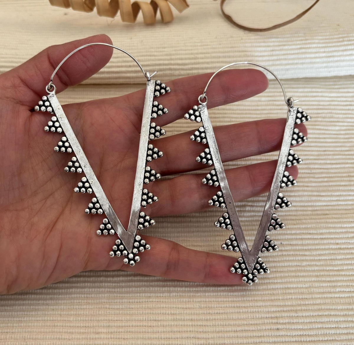 Zahara Spike Hoops - Edgy Brass Triangle Hoops with Boho Desert Vibes.