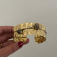 Textured Gold Cuff Bracelet with Gemstone Accents – Handcrafted Adjustable Wrap Design.