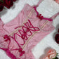 3 piece pink sheer corset set.