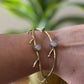Turquoise/Moonstone Twig Open Brass Bangle - Nature-inspired twig bangle with turquoise stones—bold and earthy.