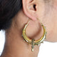 Steampunk Brass Spike Hoop Earrings - Chunky brass hoops with spike details and a bold steampunk aesthetic.