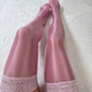 Pink shiny oil thigh high stockings