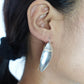 Sleek Nova Ovals - Polished Silver Long Oval Earrings – Ultra Minimal Chic.