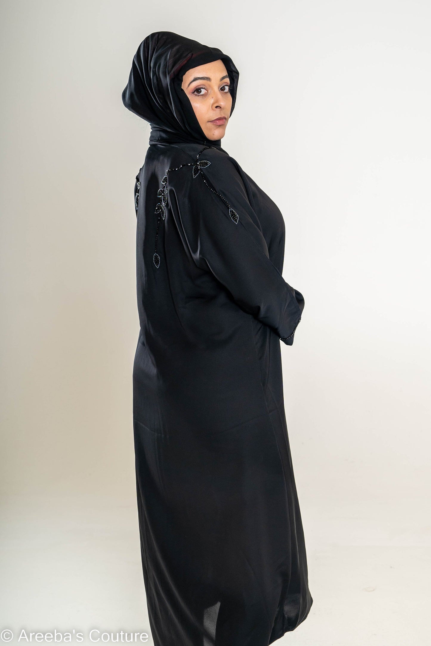 Areeba's Couture Black on Grey Cut Dana Abaya with Elegant Embroidery and Hooded Design