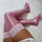 Pink shiny oil thigh high stockings