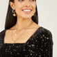 Yumi Black Star Foil Print Long Sleeve Skater Dress