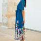 Yumi Teal Mesh Wrap Midi Dress With Floral Hem Border