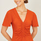 Yumi Orange Ruched Front Stretch Midi Dress
