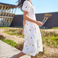 Yumi White Cotton Sunflower Embroidered Midi Dress