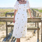 Yumi White Cotton Sunflower Embroidered Midi Dress