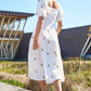 Yumi White Cotton Sunflower Embroidered Midi Dress