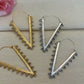 Zahara Spike Hoops - Edgy Brass Triangle Hoops with Boho Desert Vibes.
