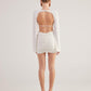 Hanna White Backless Long Sleeve Mini Dress with Removable Rose Accessory