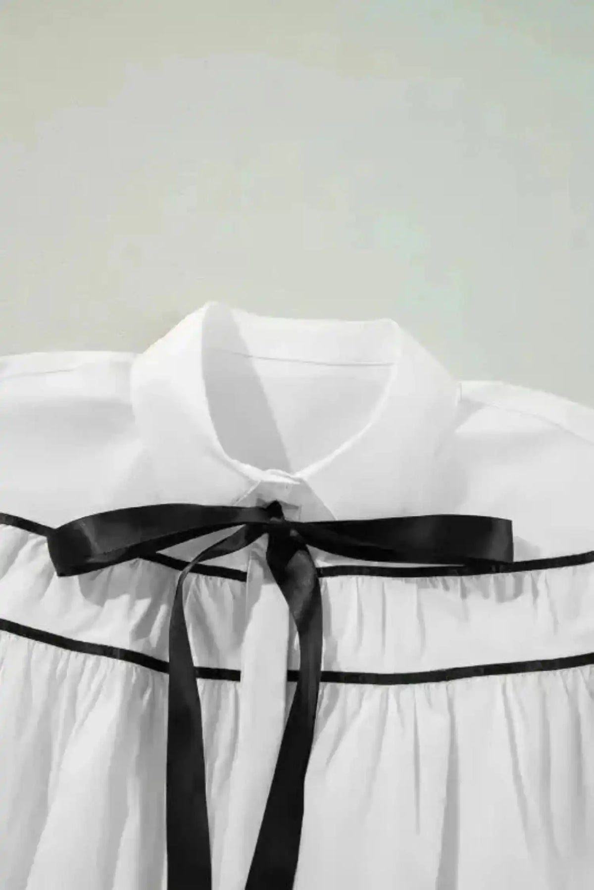 Monochrome Elegance Bowtie Blouse