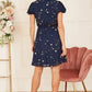 Mela Navy Foil Star Print Wrap Skater Dress