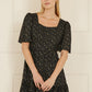 Mela Black Star Print Skater Dress
