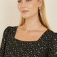 Mela Black Star Print Skater Dress