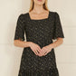 Mela Black Star Print Skater Dress