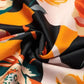 Elegant Orange Floral Long Sleeve Dress with Tie Neck