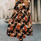 Elegant Orange Floral Long Sleeve Dress with Tie Neck