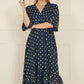 Yumi Navy Foil Print Wrap Over Dip Hem Midi Dress
